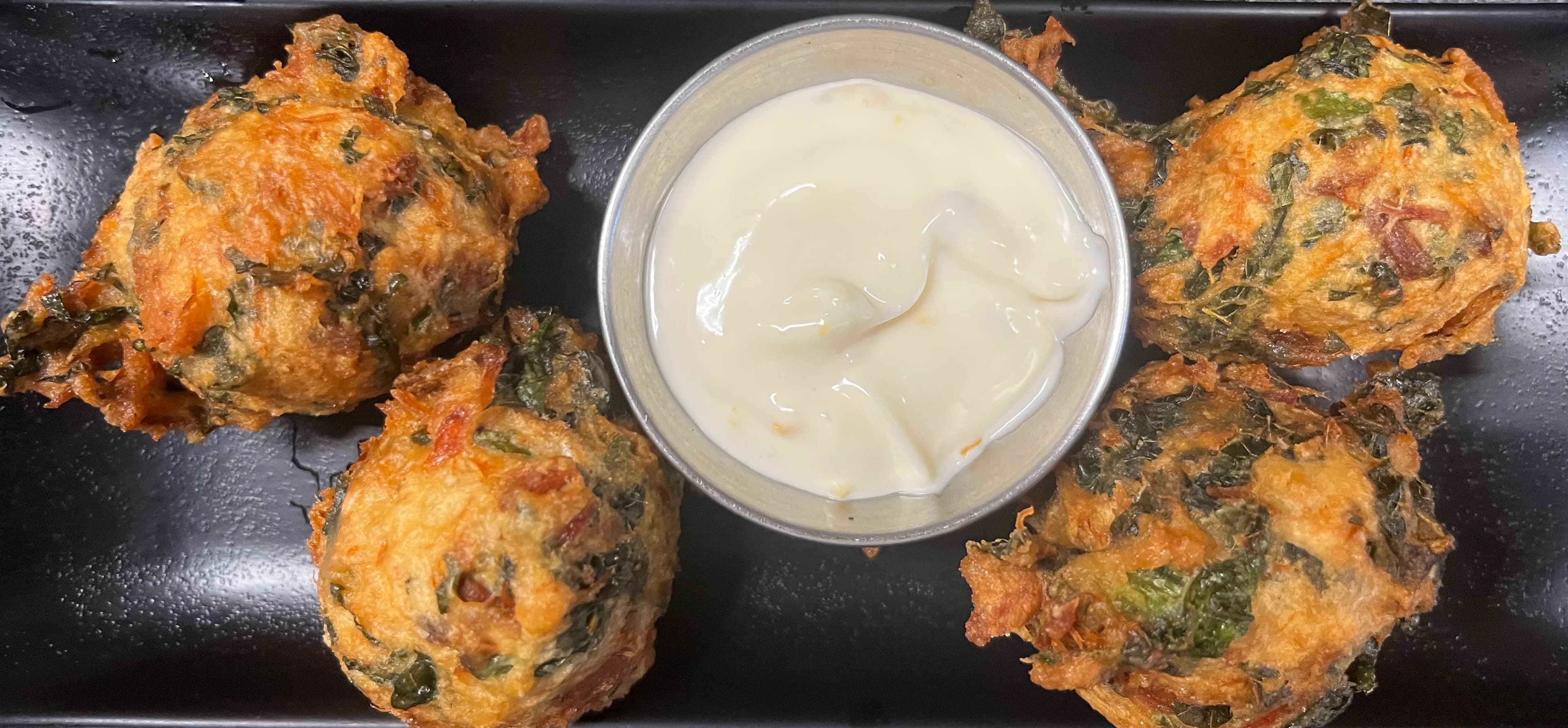 Salt fish and callaloo fritters - appetizer Image